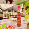 Lorenz Rosé süffiger fruchtiger Rosewein mit pinker Farbe und gutem Geschmack im Urlaub am Strand